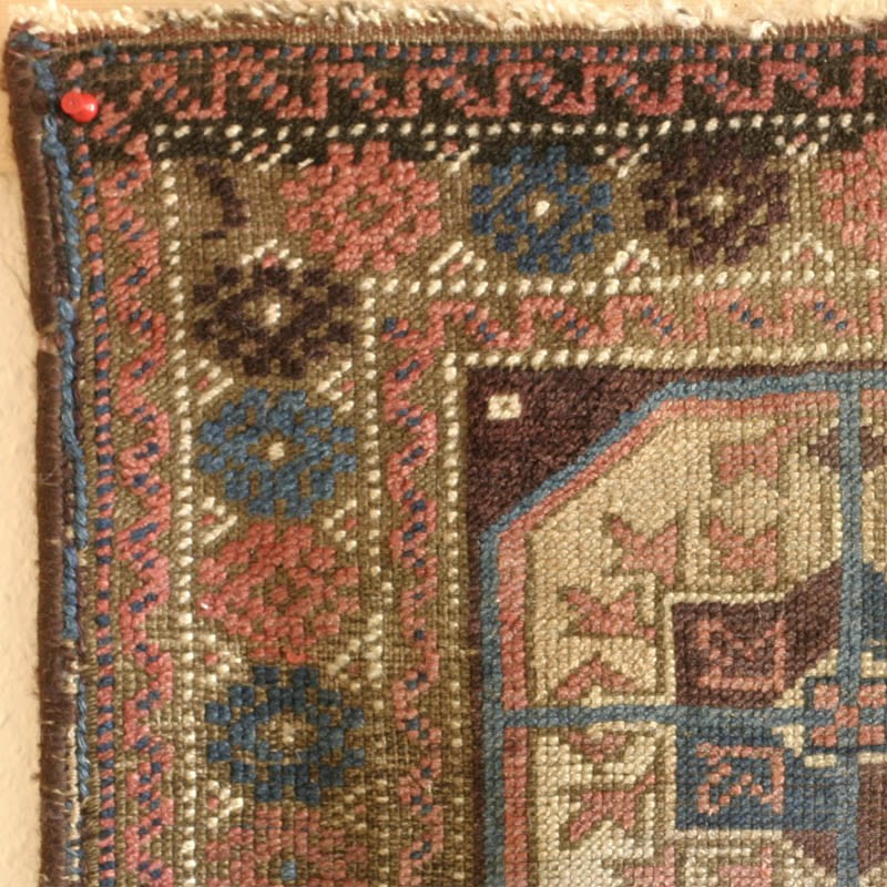 Antique Sistan? Baluch rug with Turkmen Tekke guls, ca. 1900.